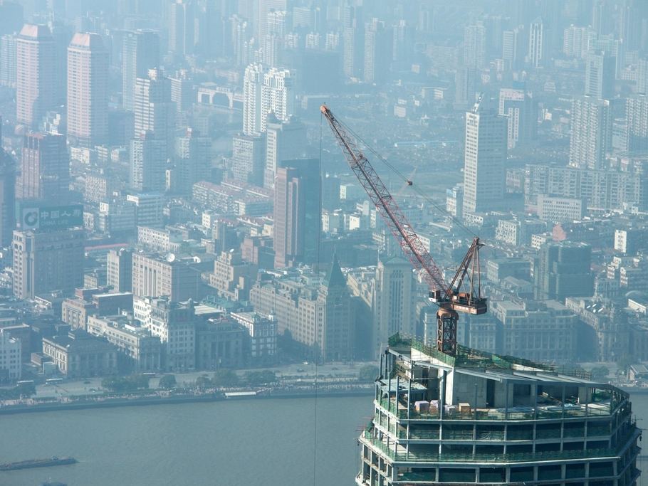Construction crane above a high-rise under construction
