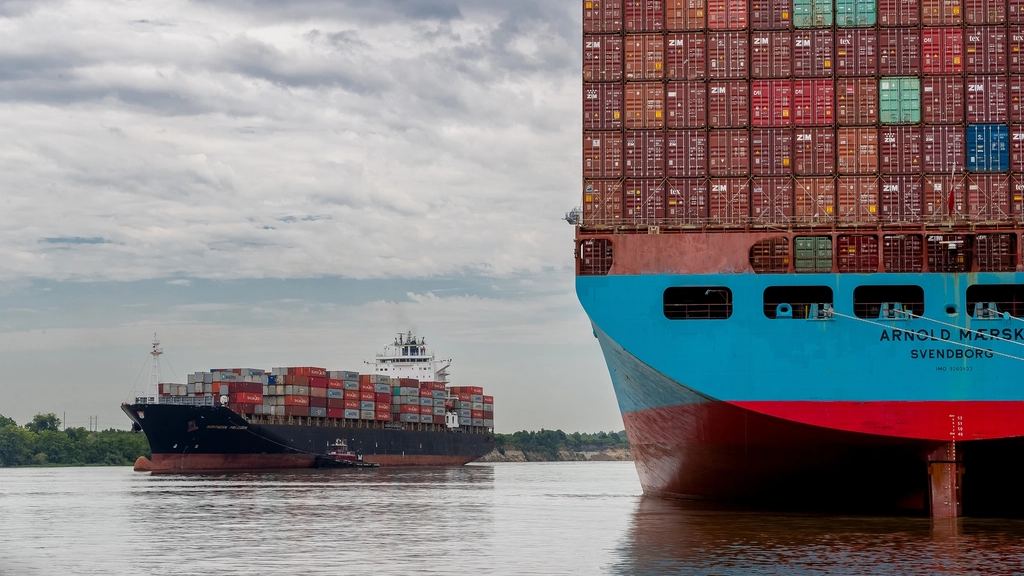 Container ships alongside a port